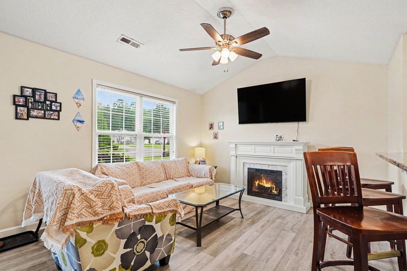 This well-maintained 3-bedroom, 2-bath home in Bristol Pines - photo 2