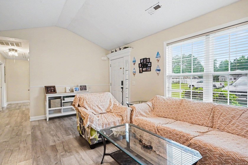 This well-maintained 3-bedroom, 2-bath home in Bristol Pines - photo 5