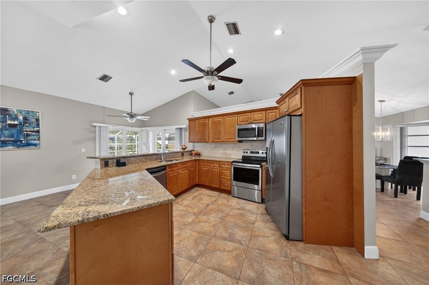 Direct sailboat access, solar-heated pool home in Cape Coral's - photo 12