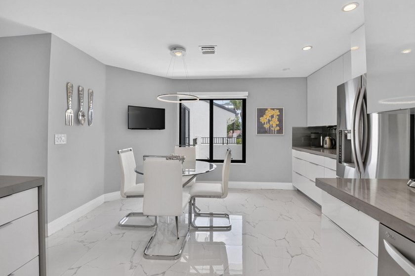 This one of a kind condo offers a modern luxury with Views of - photo 18