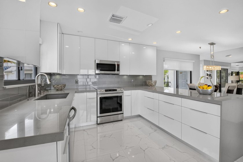 This one of a kind condo offers a modern luxury with Views of - photo 19
