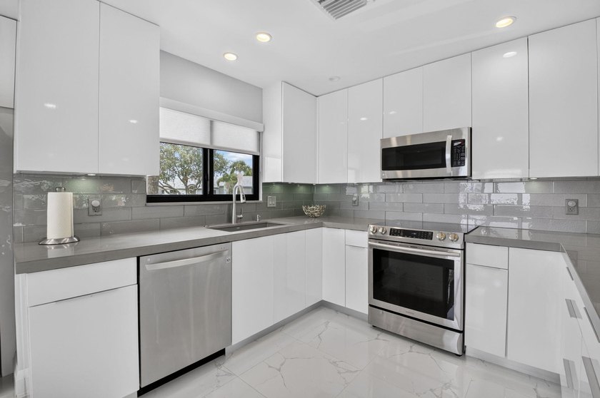 This one of a kind condo offers a modern luxury with Views of - photo 20