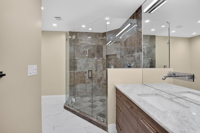 This one of a kind condo offers a modern luxury with Views of - photo 26