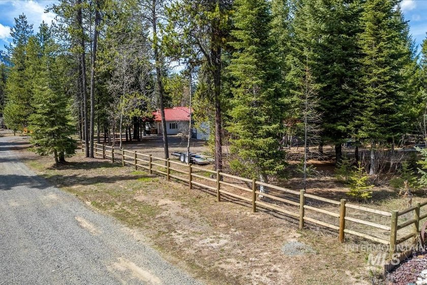 NEW PRICE! Tucked away on a peaceful, fenced .49-acre wooded lot - photo 33
