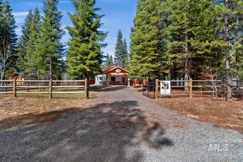 NEW PRICE! Tucked away on a peaceful, fenced .49-acre wooded lot - photo 34