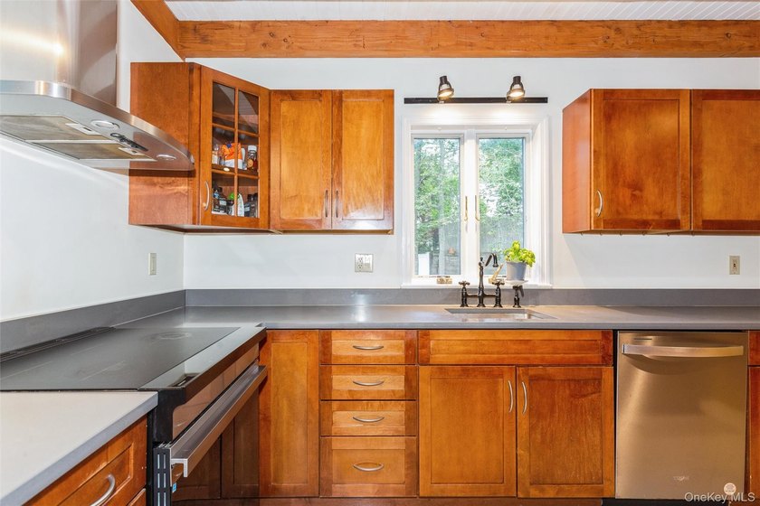 Welcome to this charming 3-bedroom, 2-bath home tucked away on a - photo 9