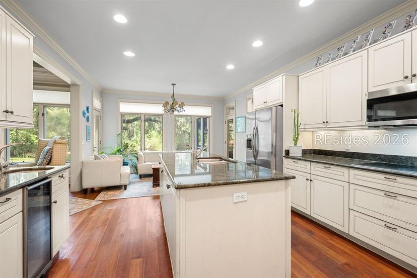 Welcome to 3 Wood Duck Court, a gracious island residence tucked - photo 26