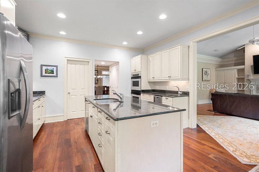 Welcome to 3 Wood Duck Court, a gracious island residence tucked - photo 31