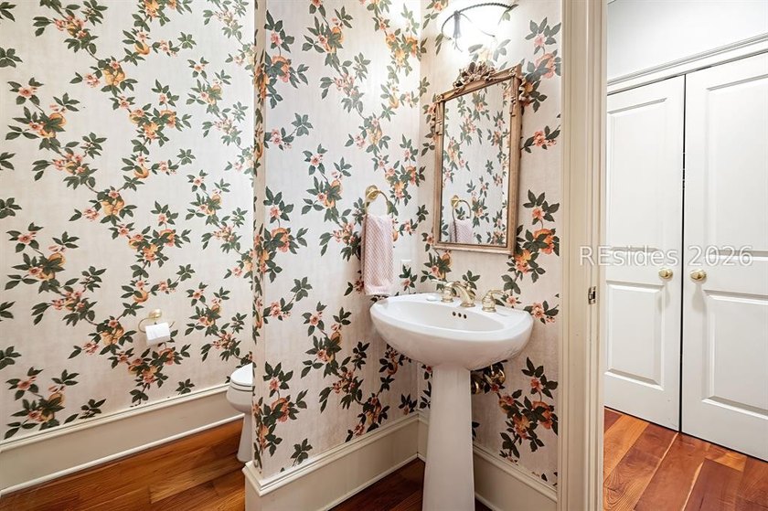 Welcome to 3 Wood Duck Court, a gracious island residence tucked - photo 37