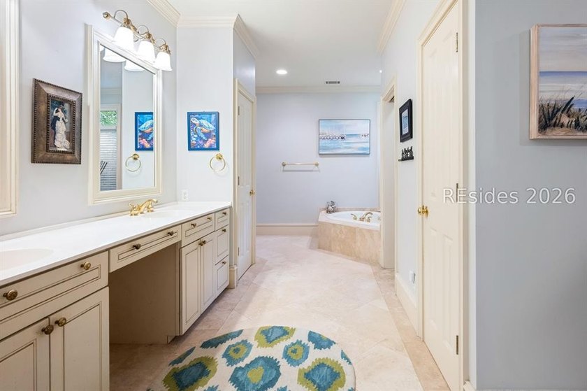 Welcome to 3 Wood Duck Court, a gracious island residence tucked - photo 42
