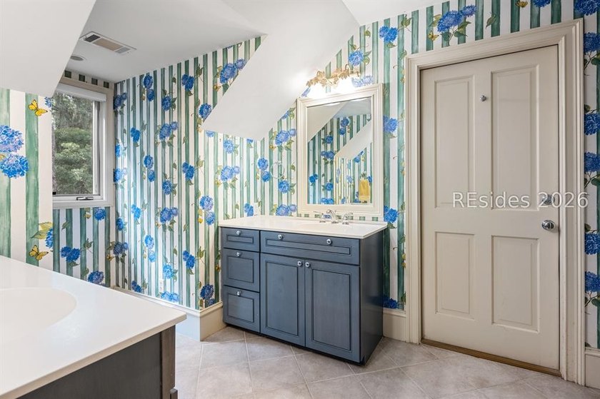 Welcome to 3 Wood Duck Court, a gracious island residence tucked - photo 50