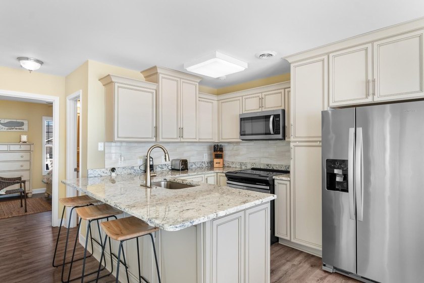 Welcome to 324 S Waccamaw Dr --- a true oceanfront escape in the - photo 2