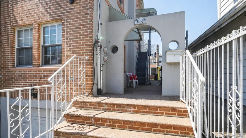 Welcome to this beautifully maintained two-family home in the - photo 2