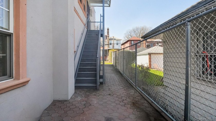 Welcome to this beautifully maintained two-family home in the - photo 4