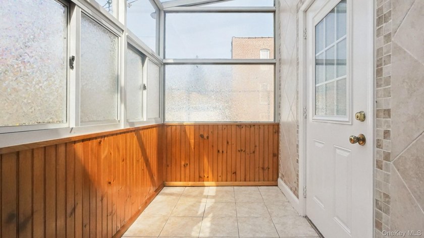 Welcome to this beautifully maintained two-family home in the - photo 8