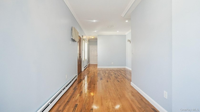 Welcome to this beautifully maintained two-family home in the - photo 10