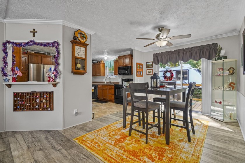 Three-bedroom, two-bathroom, single-story manufactured home with - photo 8