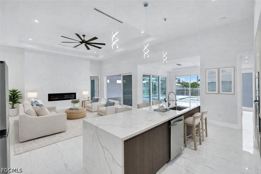 Experience elevated waterfront living in this stunning new - photo 11