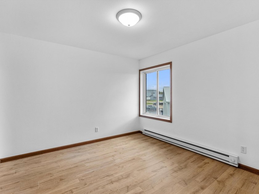 Discover this beautifully renovated second-floor condo featuring - photo 12