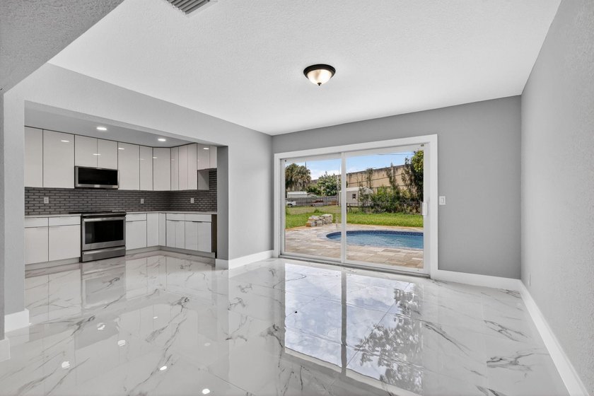 Welcome to this charming single-story residence located in Lake - photo 11