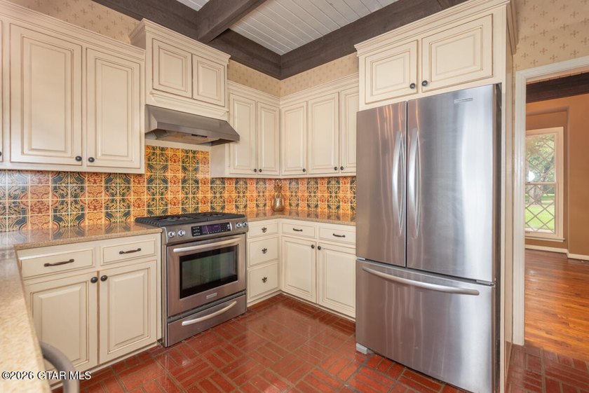 Set on 4.04 acres with pond frontage, this custom-built - photo 19