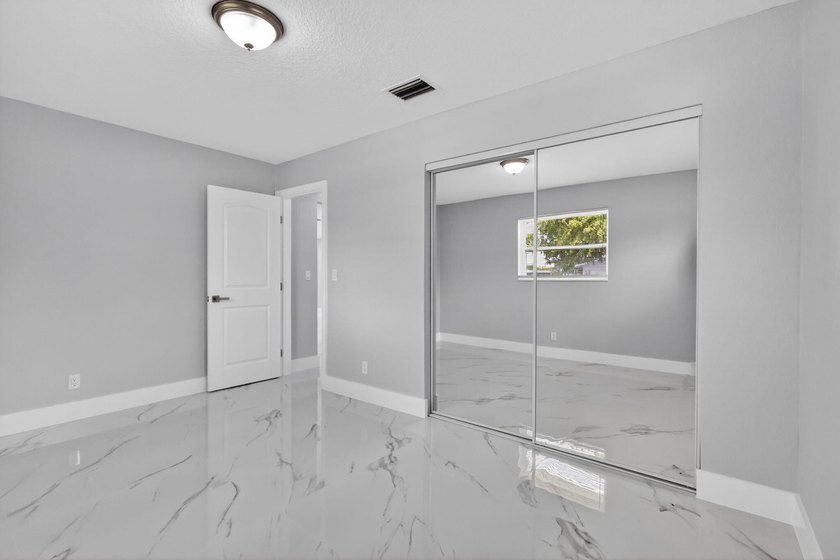 Welcome to this charming single-story residence located in Lake - photo 23