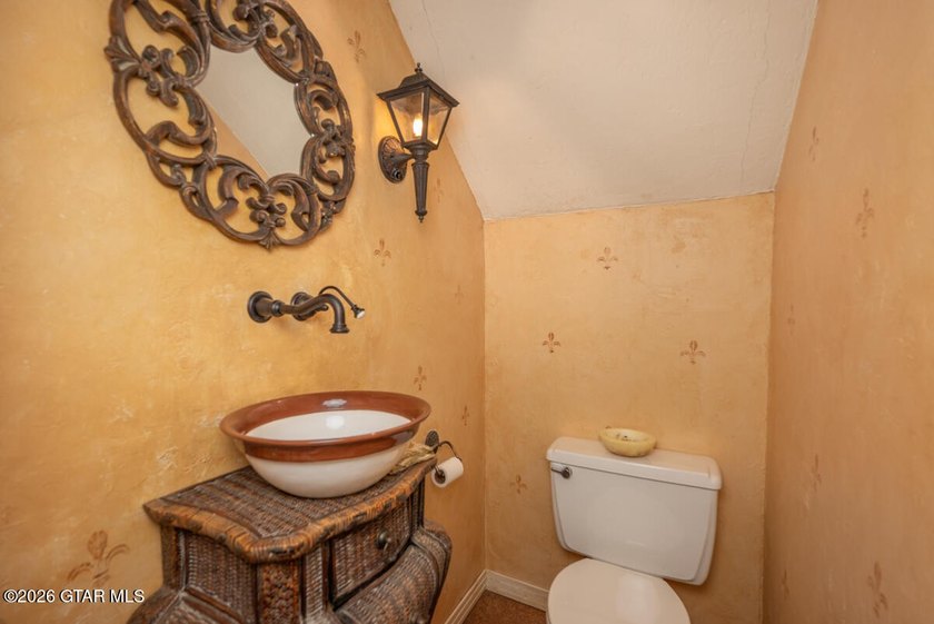 Set on 4.04 acres with pond frontage, this custom-built - photo 24