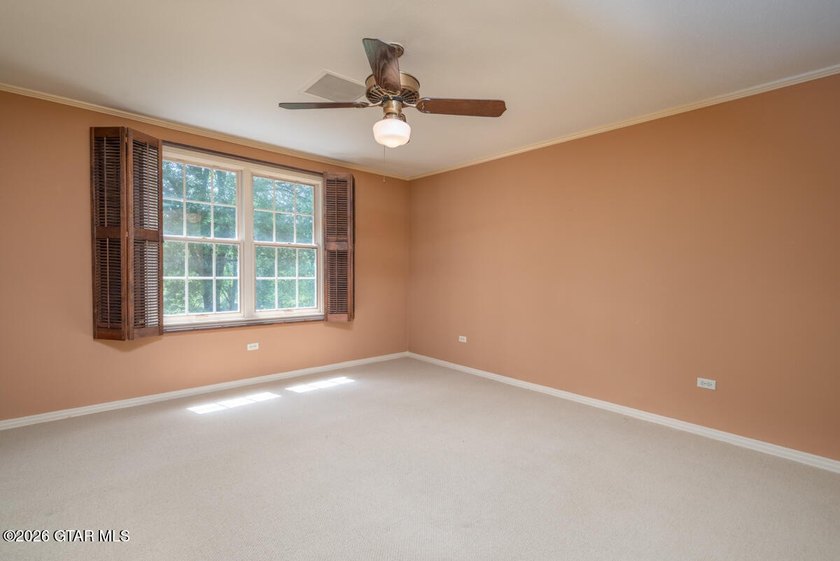 Set on 4.04 acres with pond frontage, this custom-built - photo 25