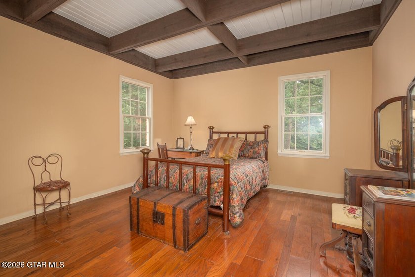 Set on 4.04 acres with pond frontage, this custom-built - photo 30