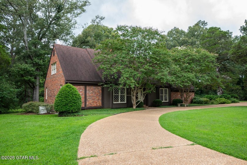 Set on 4.04 acres with pond frontage, this custom-built - photo 34