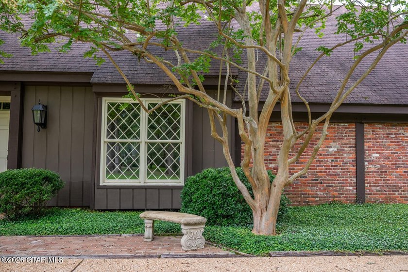 Set on 4.04 acres with pond frontage, this custom-built - photo 38