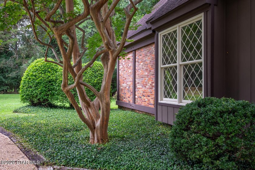 Set on 4.04 acres with pond frontage, this custom-built - photo 40