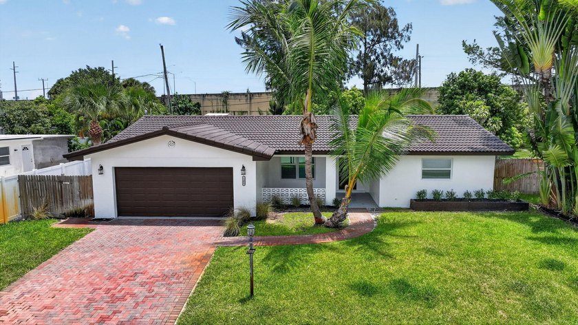 Welcome to this charming single-story residence located in Lake - photo 42