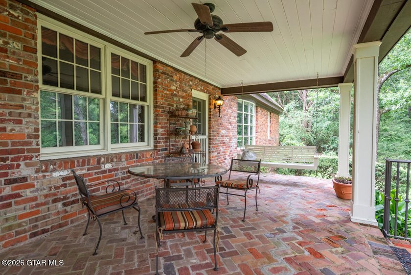 Set on 4.04 acres with pond frontage, this custom-built - photo 43