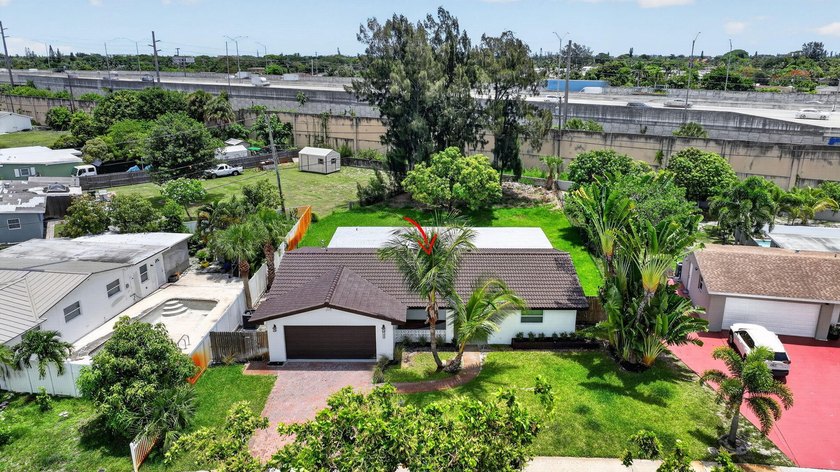 Welcome to this charming single-story residence located in Lake - photo 43