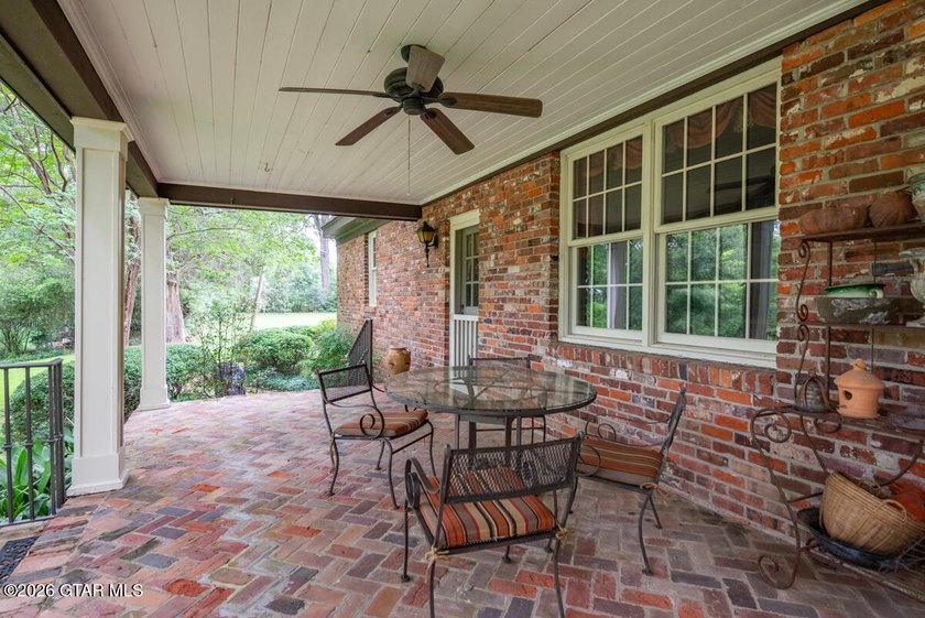 Set on 4.04 acres with pond frontage, this custom-built - photo 44