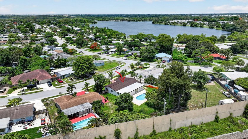 Welcome to this charming single-story residence located in Lake - photo 47