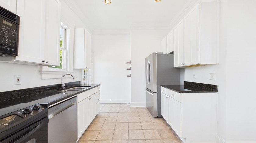 Step into timeless Charleston charm in this beautifully - photo 12