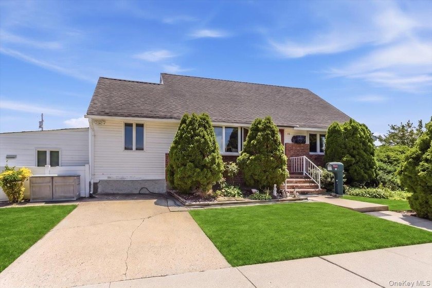 Welcome to 42 Larch Street in Hicksville, a well-maintained cape - photo 2