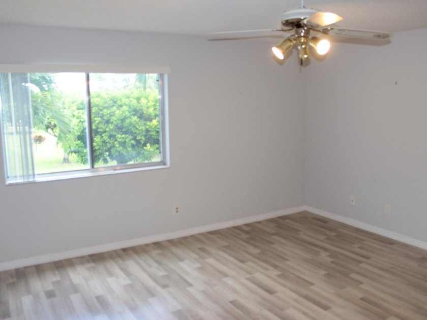 Welcome to this thoughtfully designed three-bedroom - photo 12
