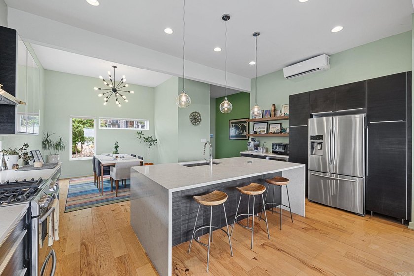 Perched above The Capitol, this contemporary retreat is designed - photo 13