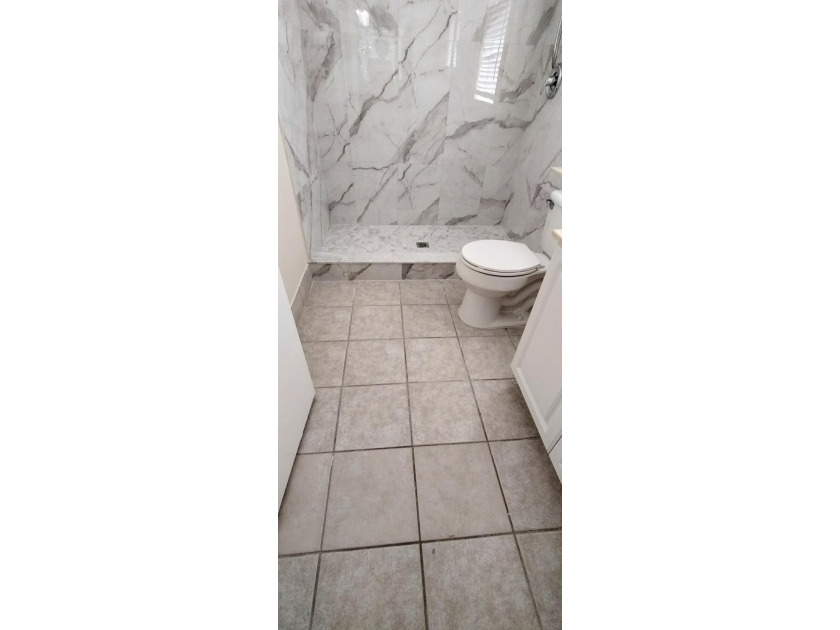 Step into this beautifully renovated 2-bedroom,2-master suite - photo 13