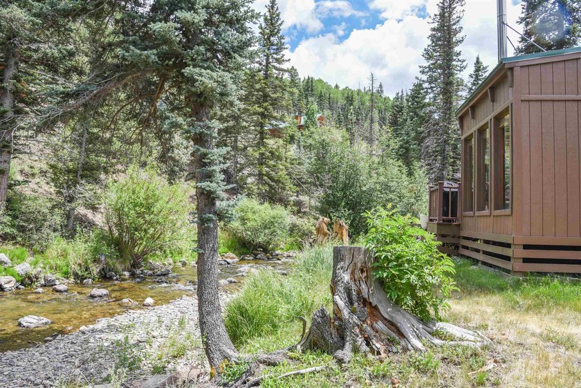 Set right on the river in Valley of the Pines, this 1 - photo 3