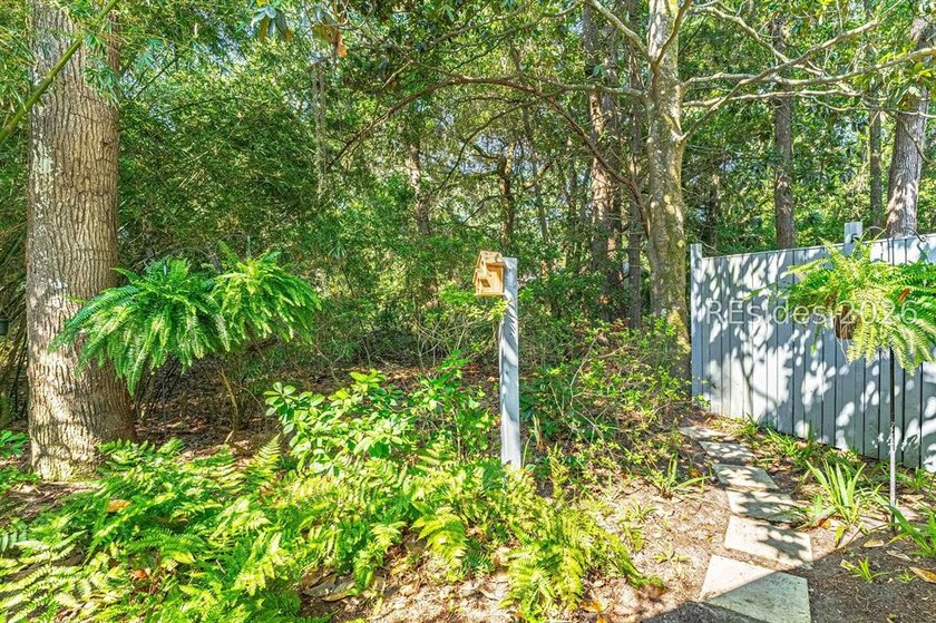 Welcome to this calming, nature oriented, three bedroom, three - photo 50