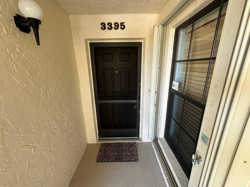 Discover this beautifully maintained condominium in the heart of - photo 2