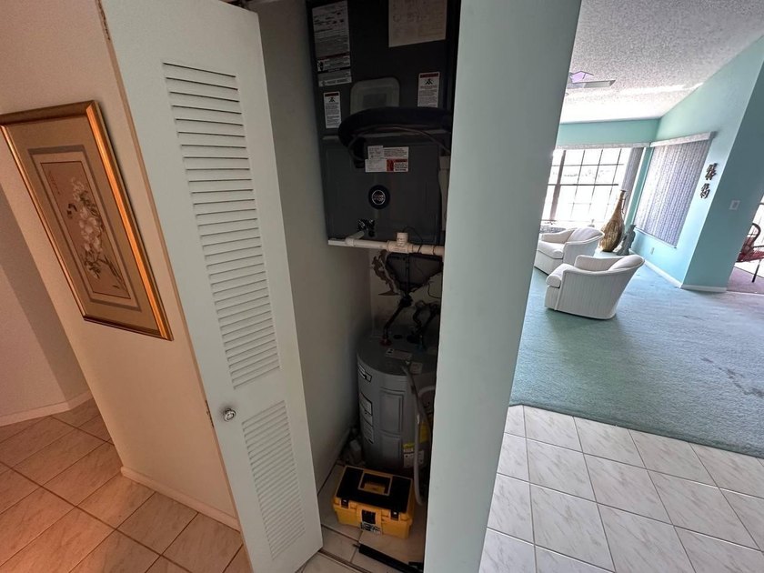 Discover this beautifully maintained condominium in the heart of - photo 9