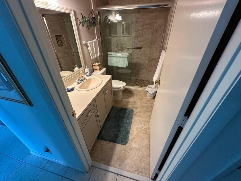 Discover this beautifully maintained condominium in the heart of - photo 10