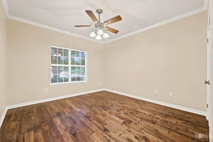 This beautiful home offers spacious living with soaring ceilings - photo 26