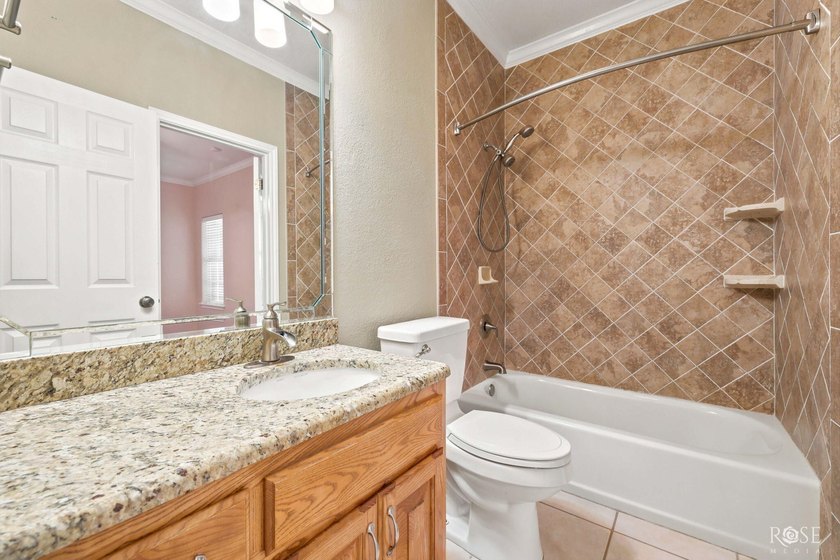 This beautiful home offers spacious living with soaring ceilings - photo 27
