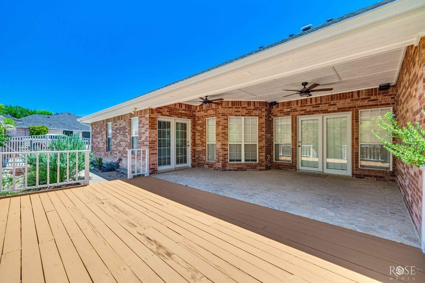 This beautiful home offers spacious living with soaring ceilings - photo 32